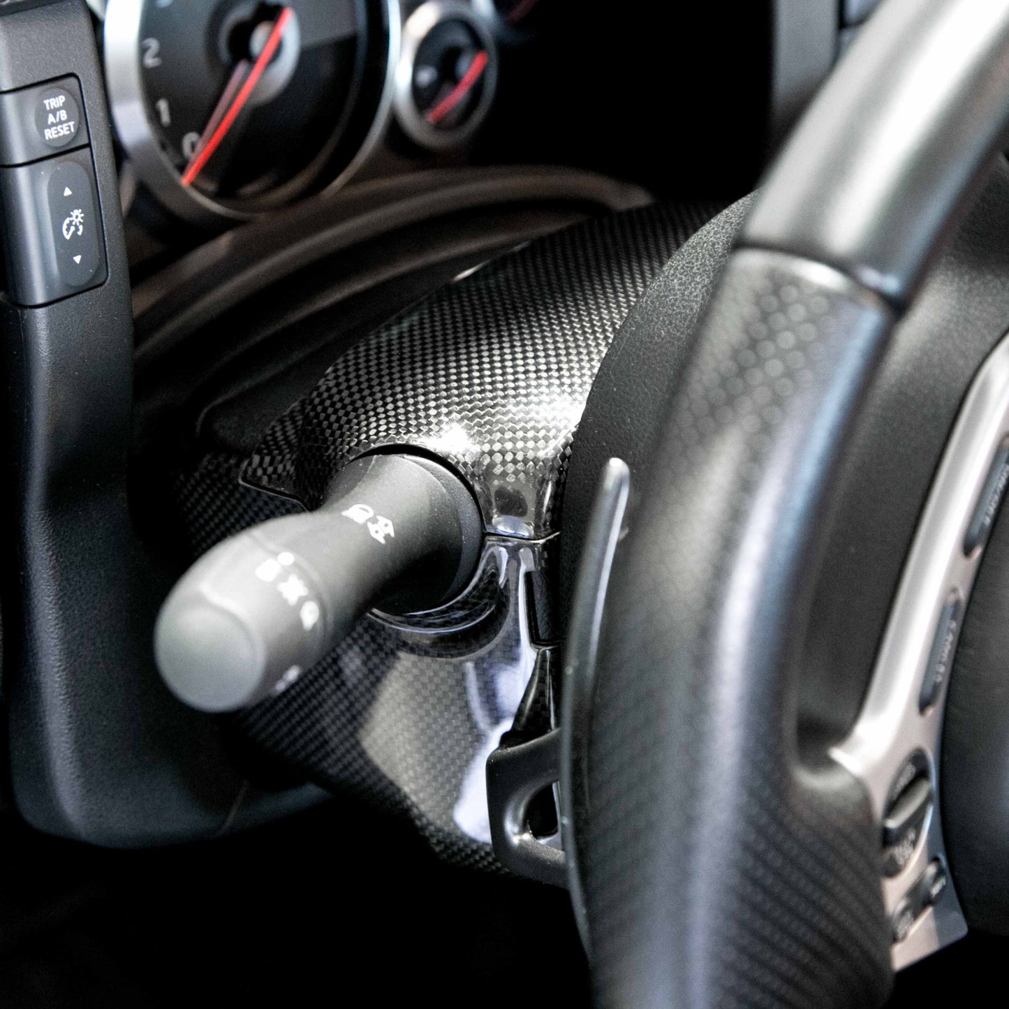 Seibon 09-14 Nissan GTR Carbon Fiber Steering Column Surround Trim CFI0910NSGTR-G
